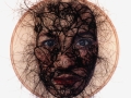 No title-selfpotrait (2004) Transferprint and horsehair on leather (26,5 cm)